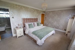 Bedroom One- click for photo gallery